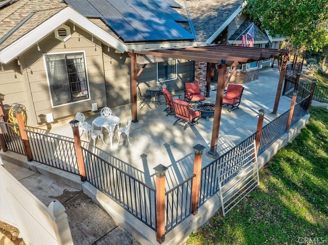 wooden deck featuring a fire pit