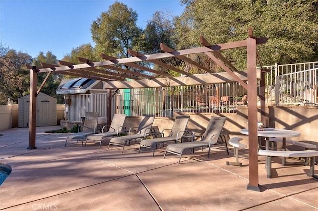 view of patio / terrace with a storage shed