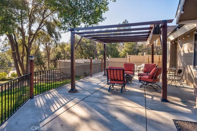 view of patio / terrace with an outdoor living space and a pergola