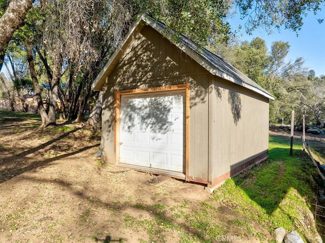 view of outbuilding featuring a garage