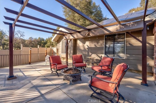 view of patio with a pergola and an outdoor fire pit