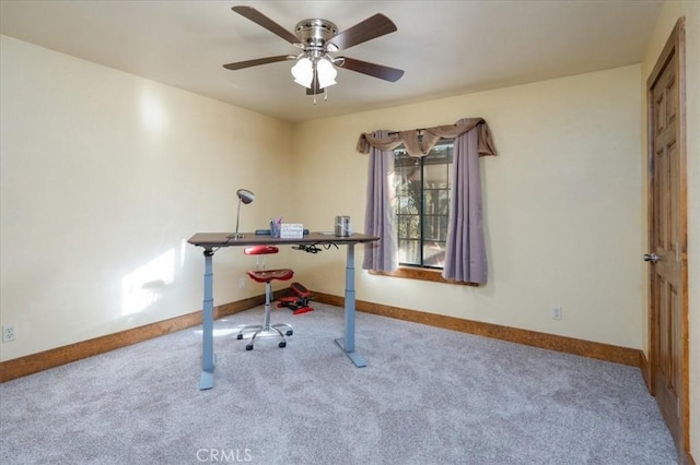 office featuring carpet floors and ceiling fan