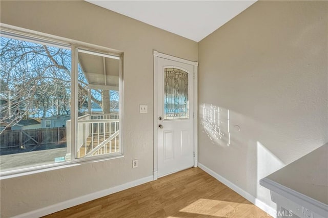 entrance foyer with light wood-type flooring