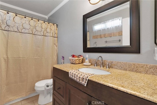 bathroom with ornamental molding, vanity, tile patterned floors, and toilet