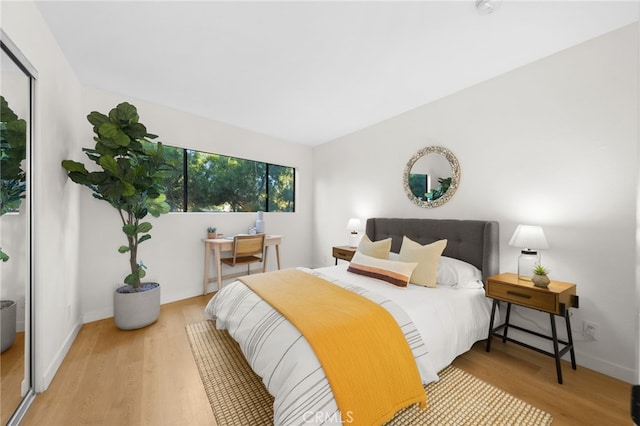 bedroom featuring light wood-type flooring