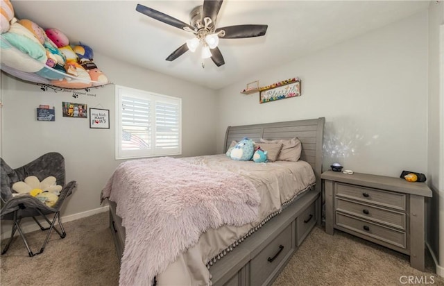 bedroom featuring ceiling fan and light colored carpet