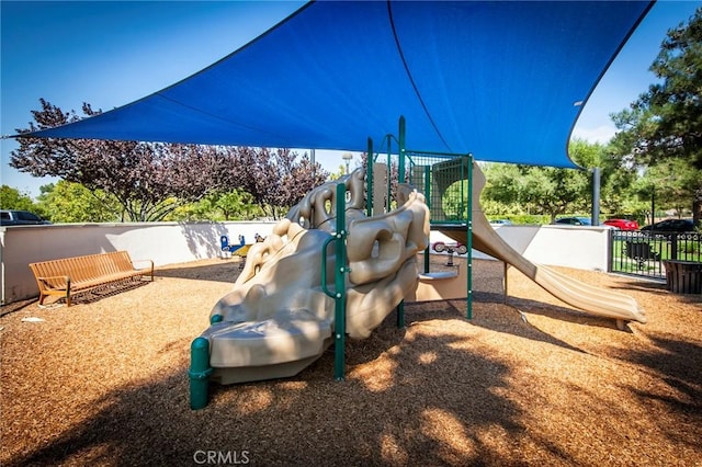 community play area with fence