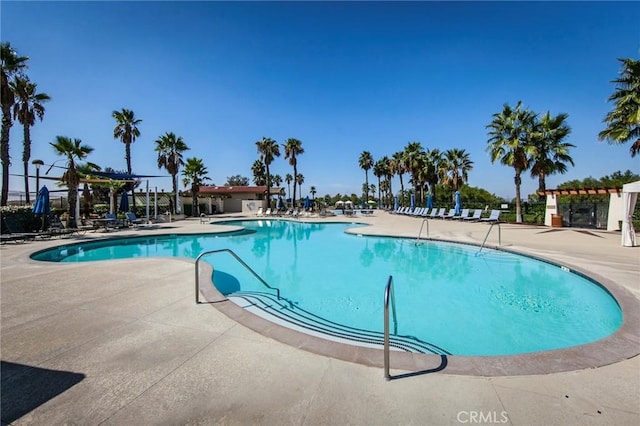 pool with a patio