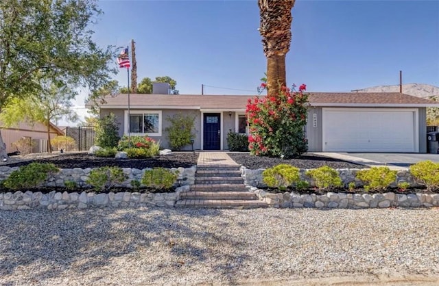 ranch-style house with a garage