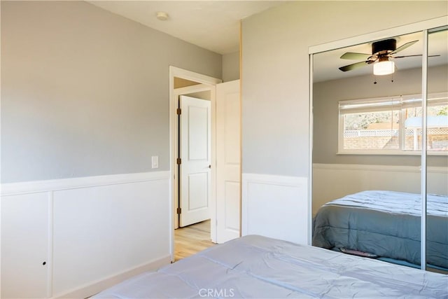 bedroom featuring ceiling fan and light hardwood / wood-style floors