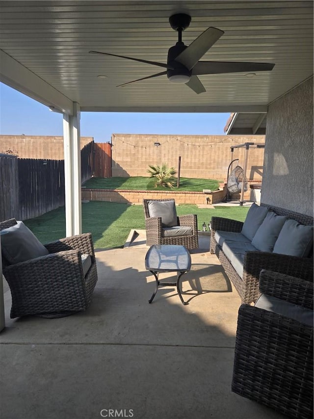 view of patio featuring an outdoor hangout area and ceiling fan