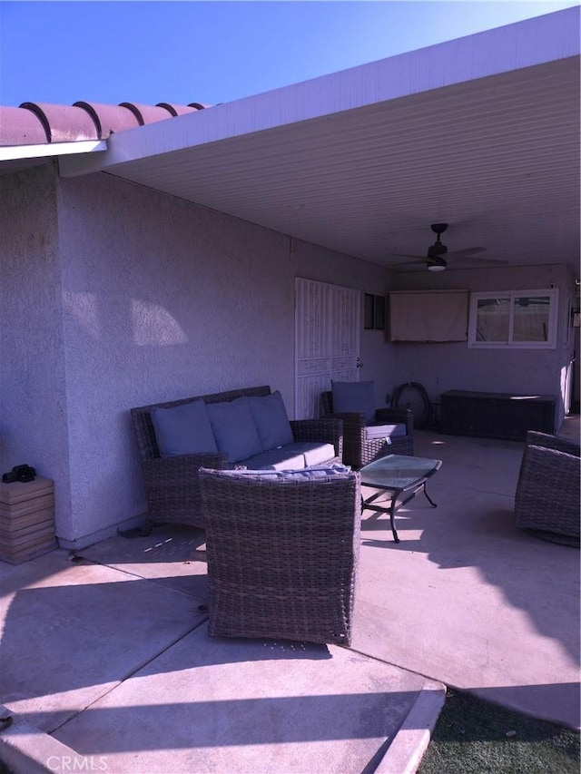 view of patio / terrace with an outdoor hangout area and ceiling fan