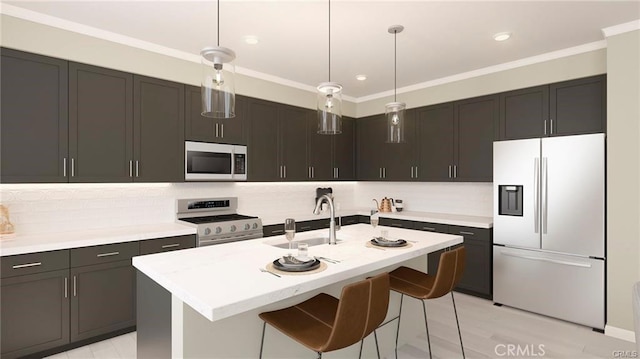 kitchen featuring sink, fridge with ice dispenser, stainless steel gas range oven, hanging light fixtures, and an island with sink