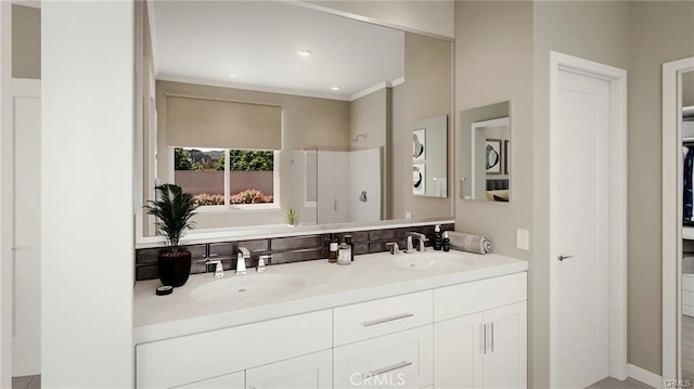 bathroom featuring vanity and crown molding