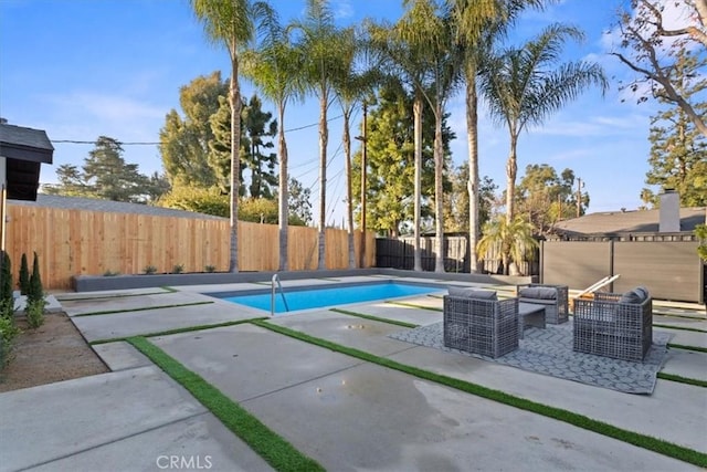 view of pool with an outdoor hangout area and a patio area