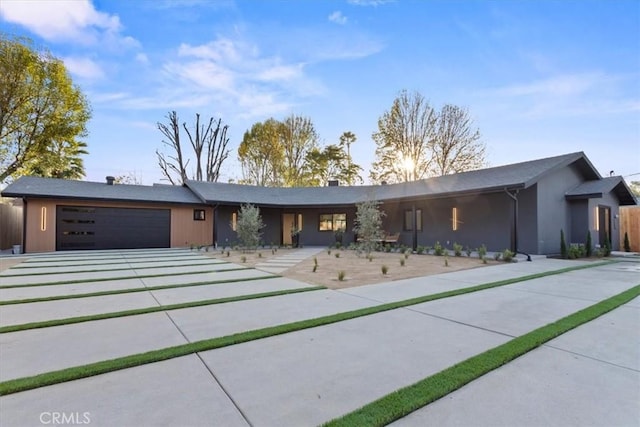 single story home featuring a garage