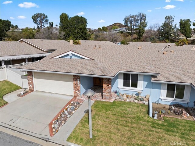 26478 Fairway Cir, Newhall, CA 91321 - ranch-style house with roof with shingles, a garage, driveway, and brick siding