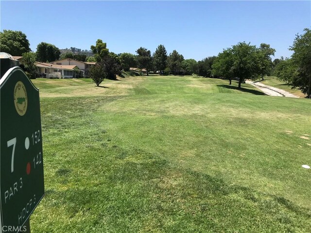 26478 Fairway Cir, Newhall, CA 91321 - view of grassy yard with view of golf course and view of wooded area