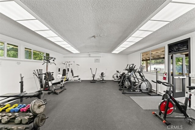 26478 Fairway Cir, Newhall, CA 91321 - gym featuring a textured ceiling