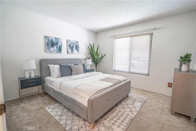 26478 Fairway Cir, Newhall, CA 91321 - bedroom with a textured ceiling and light carpet