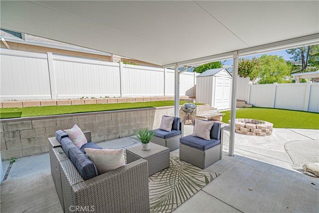 26478 Fairway Cir, Newhall, CA 91321 - fenced backyard featuring a patio and an outdoor living space with a fire pit