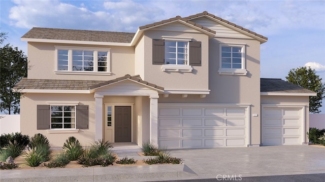 view of front of home with a garage