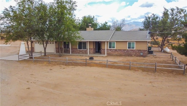 view of front of home with a garage