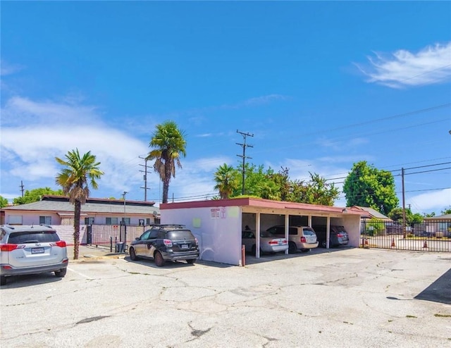 view of parking featuring a carport