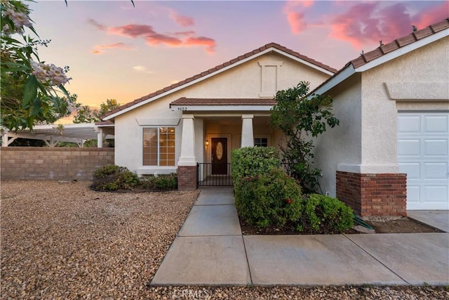 view of front of home with a garage