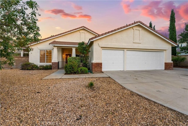 view of front of property featuring a garage