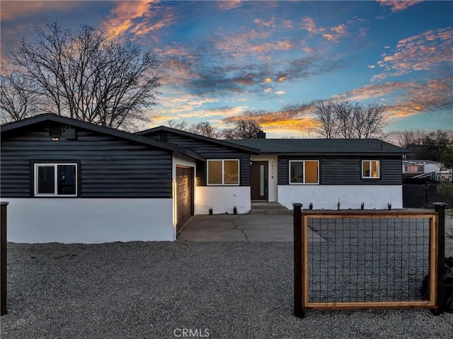 single story home featuring a garage