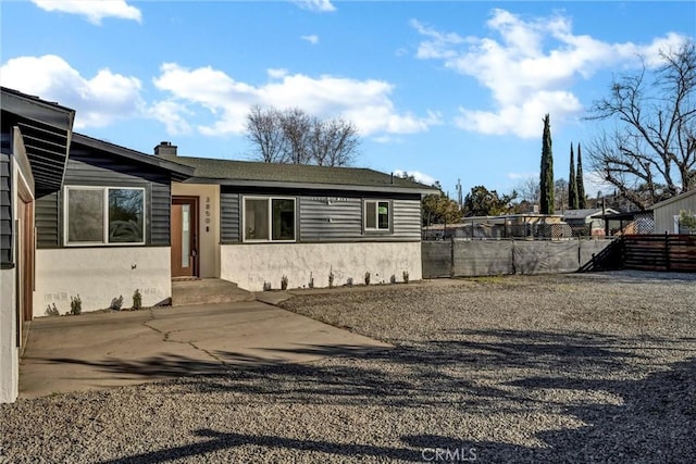 view of front of property featuring a patio