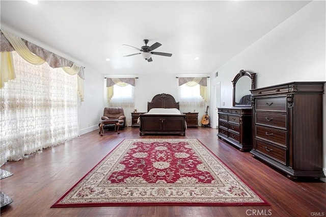 bedroom featuring dark hardwood / wood-style flooring and ceiling fan