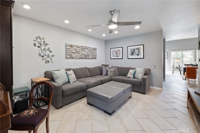 tiled living room featuring ceiling fan