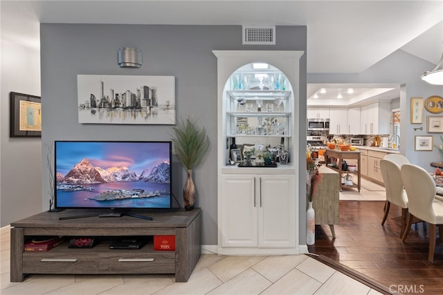 living room with sink