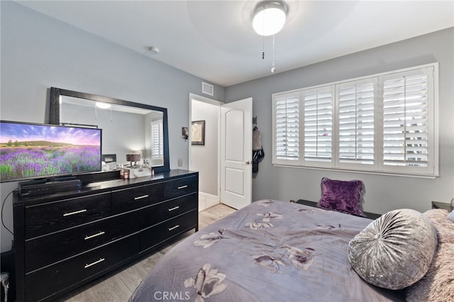 bedroom featuring light hardwood / wood-style flooring