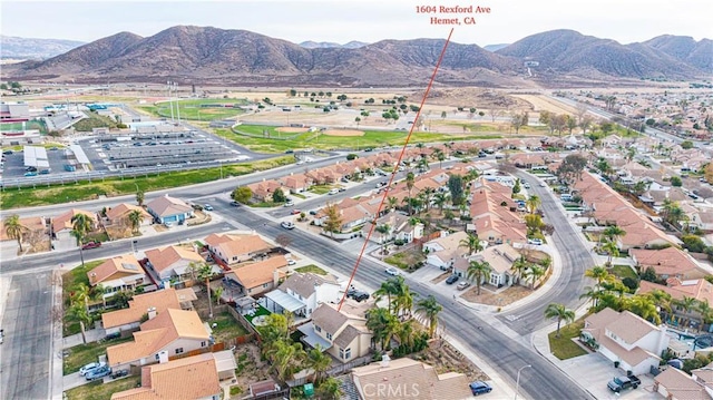 drone / aerial view featuring a mountain view