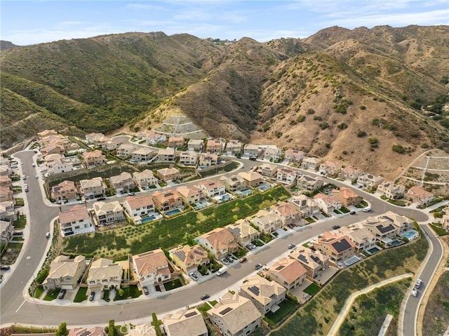 bird's eye view with a residential view and a mountain view