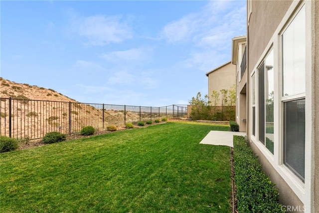 view of yard with a fenced backyard