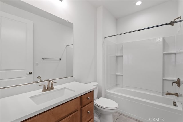 bathroom featuring toilet, tile patterned floors, vanity, washtub / shower combination, and recessed lighting