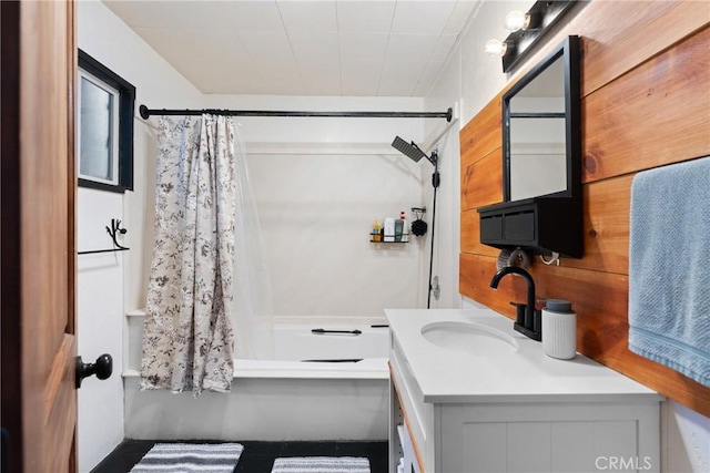 bathroom with vanity and shower / tub combo with curtain