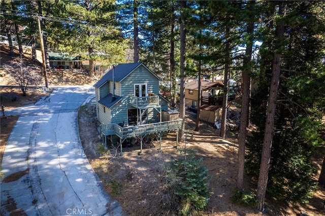 view of front of house featuring a wooden deck