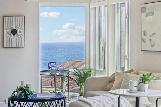 balcony featuring a water view