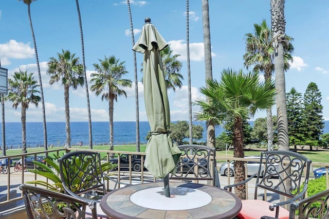 view of patio / terrace featuring a water view