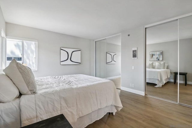 bedroom featuring dark hardwood / wood-style floors