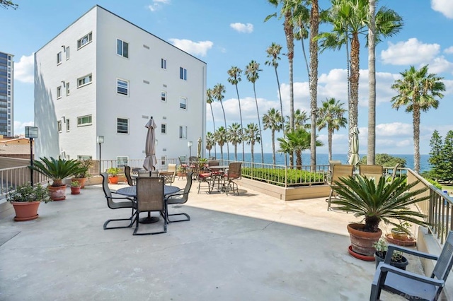 view of patio featuring a water view