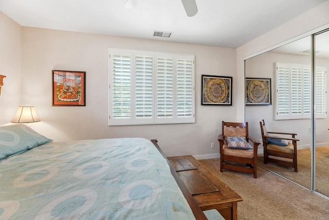 bedroom featuring carpet flooring, ceiling fan, and a closet