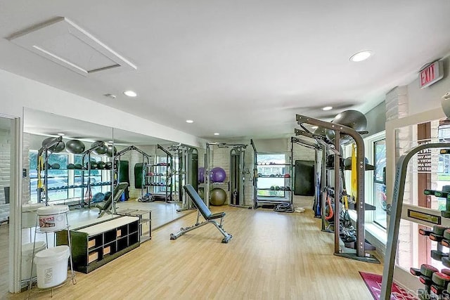 workout area with hardwood / wood-style flooring