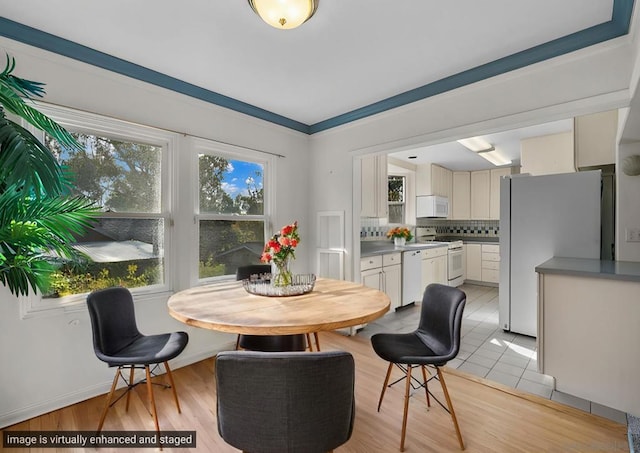 dining room featuring light hardwood / wood-style floors