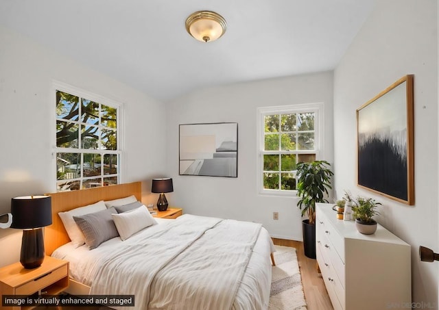 bedroom with light wood-type flooring